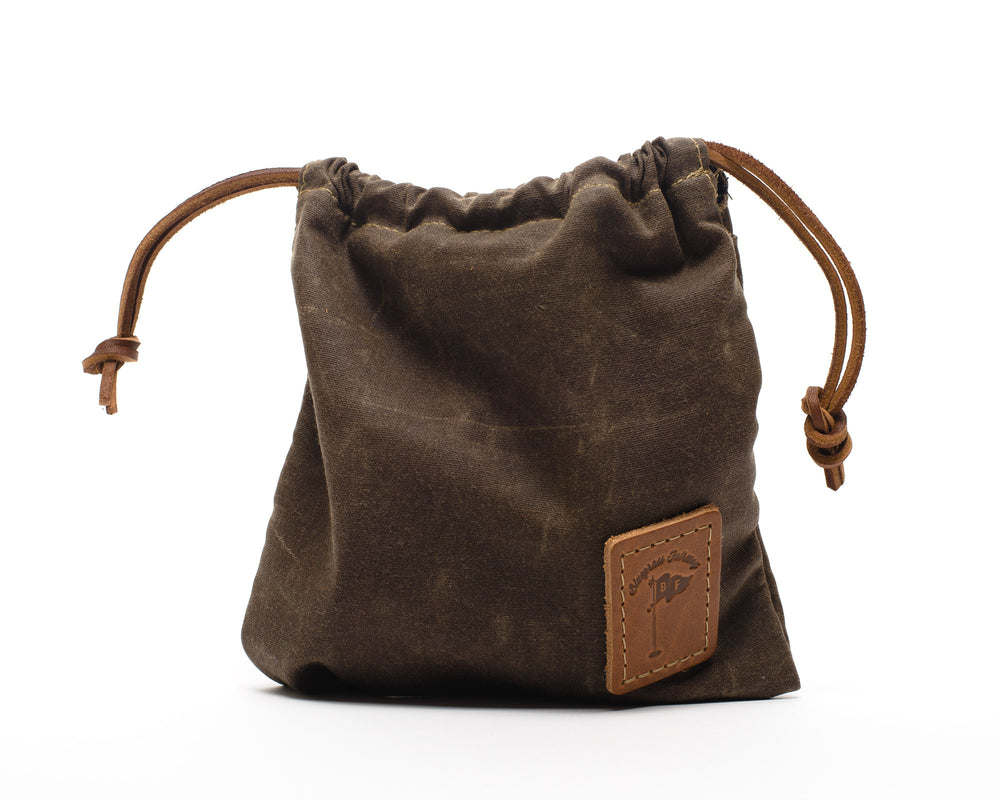 
            
                Load image into Gallery viewer, Waxed Canvas Golf Drawstring Valuables Pouch in Bourbon - Bluegrass Fairway
            
        